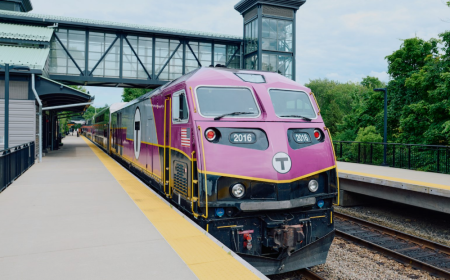 There’s a moment in every trip when you shift from outside to waiting—when the world softens just enough for travel to begin. The route 128 station  is that space for many: suburban, unassuming, steady. It doesn’t call attention to itself but holds a presence. It doesn’t shout; it holds.