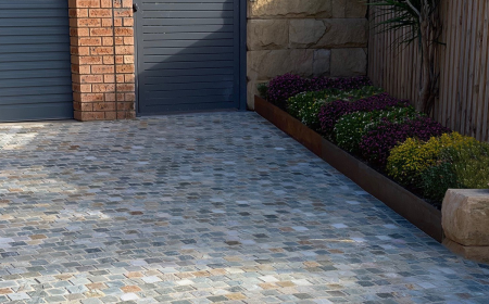 Framing Your Landscape: Why Travertine Cobblestones Elevate Curb Appeal
