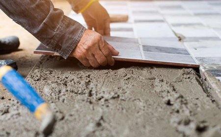 What a Tile Installation Contractor in Pawtucket, RI Really Does