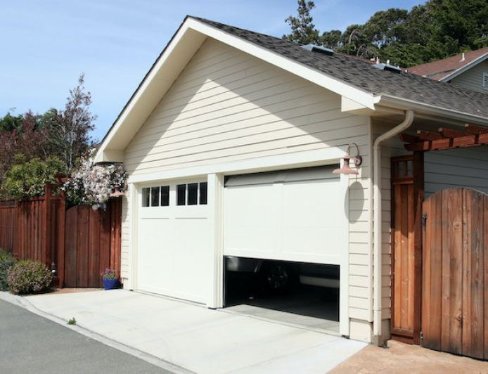 Why Raleigh NC’s Humidity and Heat Shorten the Life of Broken Garage Door Springs
