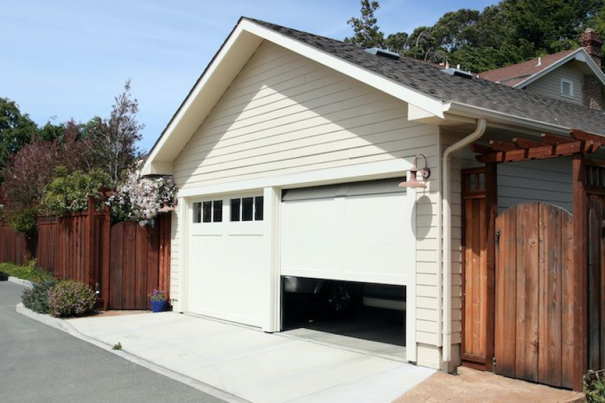 Why Raleigh NC’s Humidity and Heat Shorten the Life of Broken Garage Door Springs
