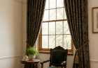 What Should Homeowners Know When Choosing Curtain Rods and Tracks for Corner Windows?